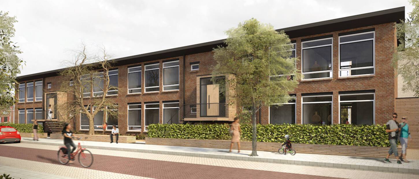 Een schoolgebouw van 2 verdiepingen.